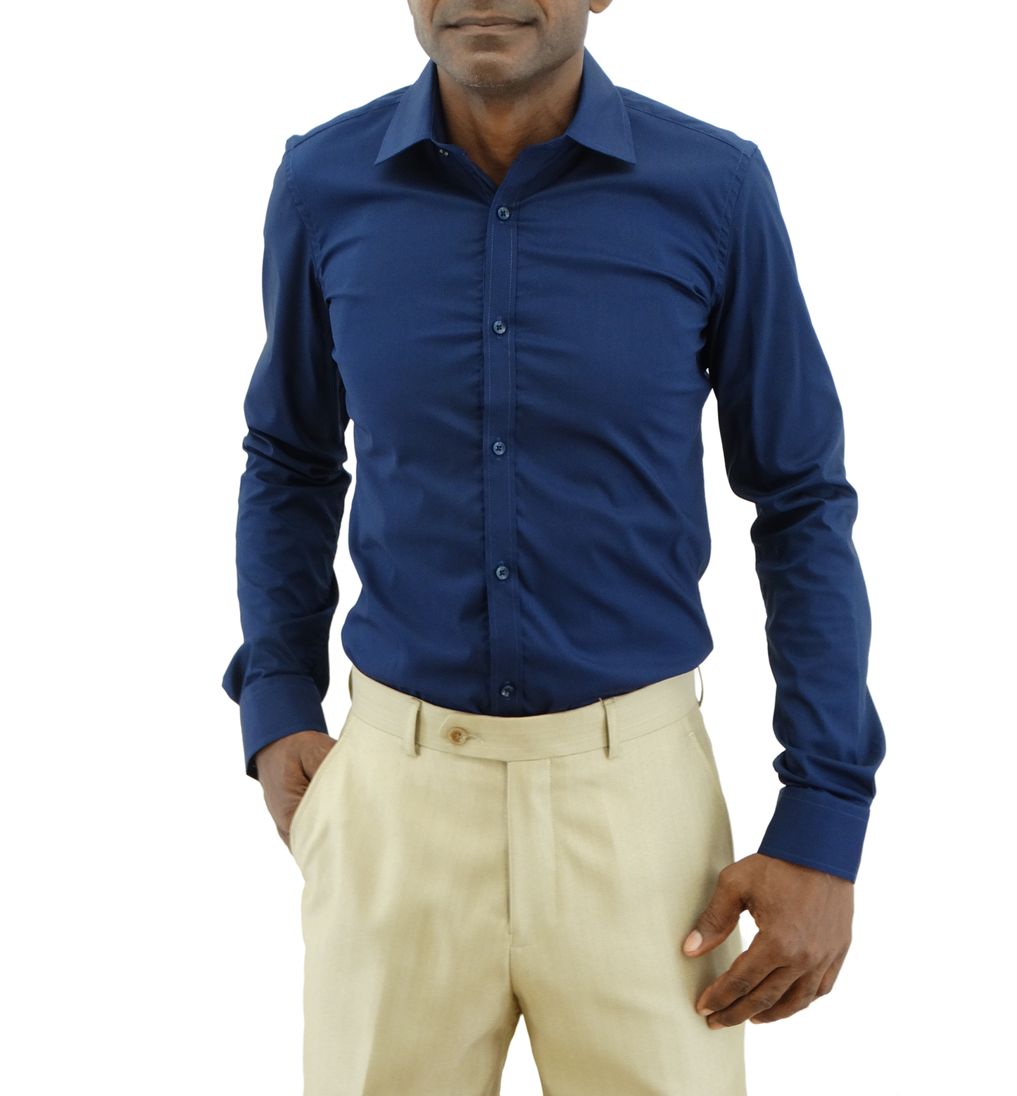 A man wearing a long-sleeve blue button-down dress shirt and beige pants.